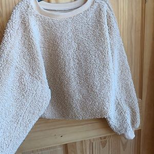 cream colored cropped sherpa sweater